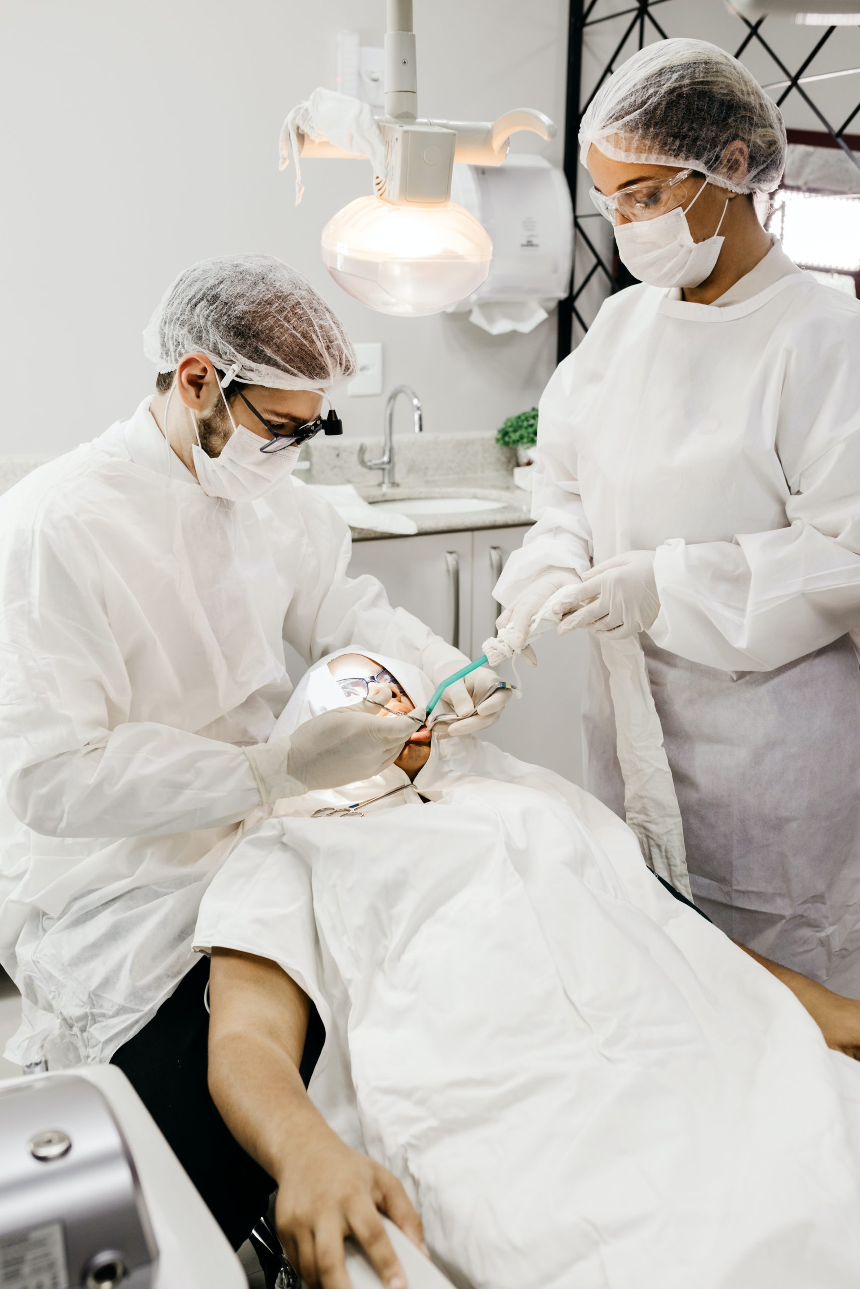Emergency dentist carrying out surgery