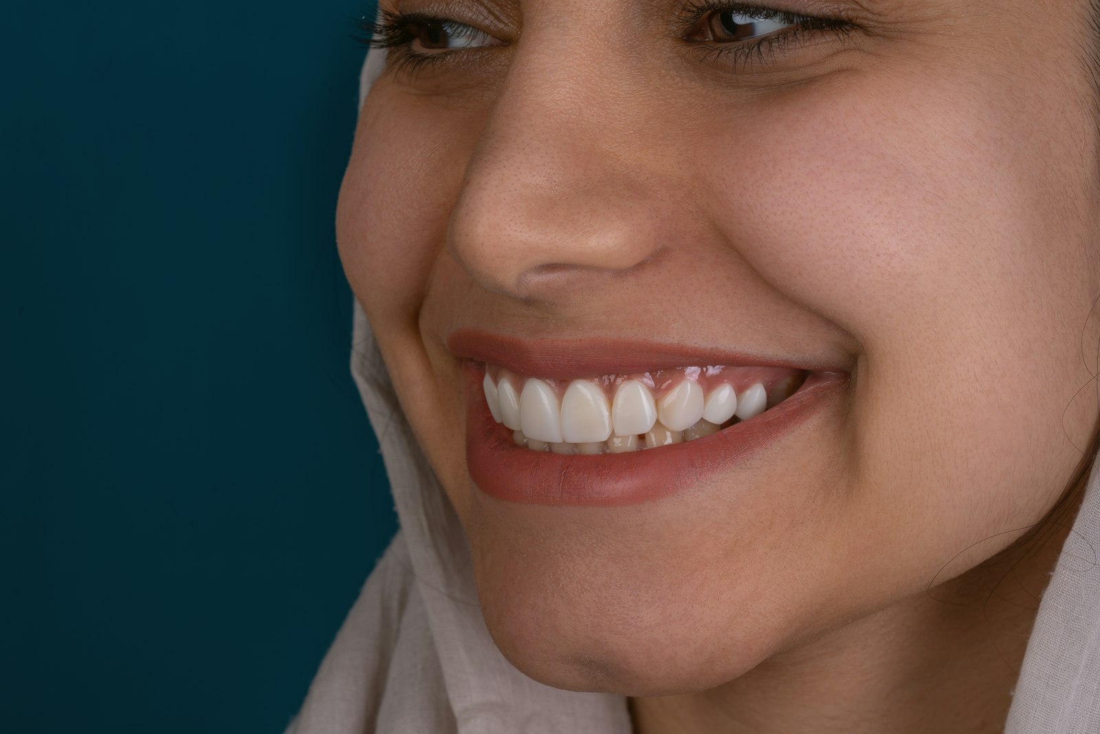 A close up of a woman with a smile on her face A close up of a woman with a smile on her face